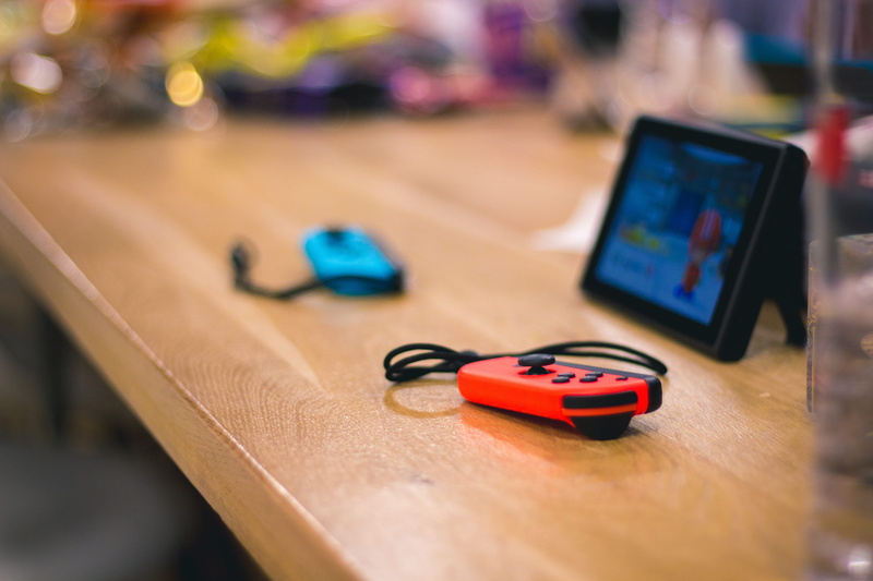 equipment, wireless technology, gaming, selective focus, united kingdom, joycon, number, table, communication, still life, indoors, 5K, close-up, relaxation