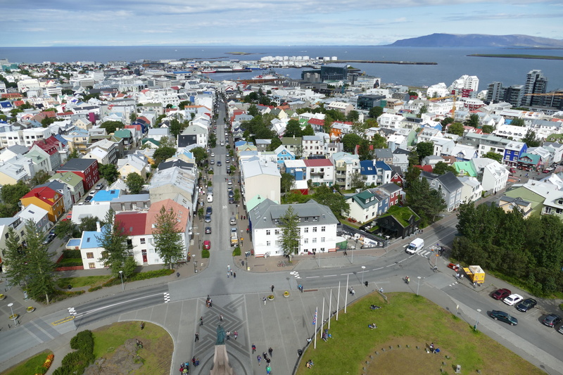 day, road, land vehicle, building, outdoors, architecture, hallgrímskirkja, city, Reykjavik, architecture And Buildings, car, no people, outlook, plant