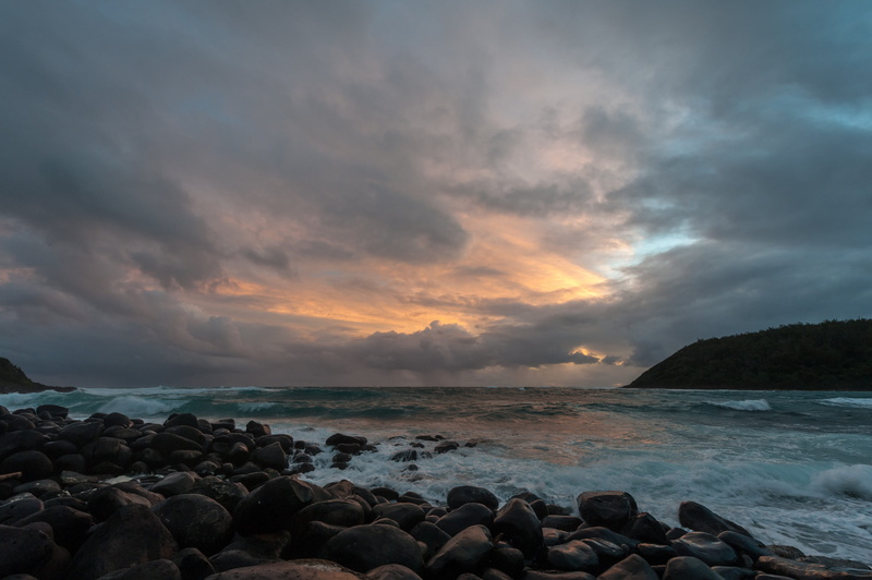 bay, tranquil scene, pacific, kauai, sunset, waves, sky, no people, rain, water, non-urban scene, horizon, scenics - nature, stones, sea, pebble, ocean