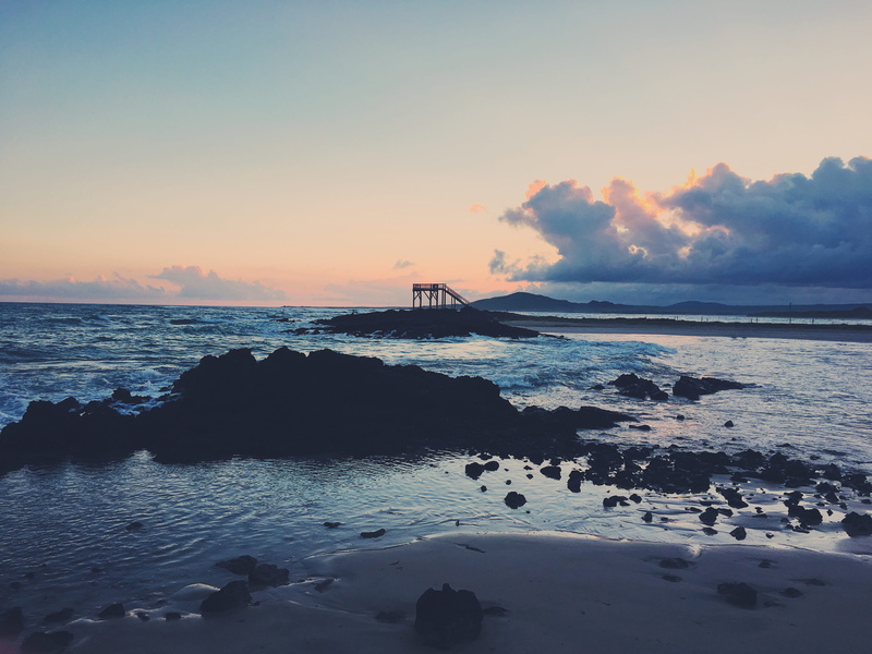 sunset, island, beauty in nature, isabela island, rock, blue sky, ecuador, tranquil scene, nature, water, solid, cloud - sky, tranquility, land, tide, sand