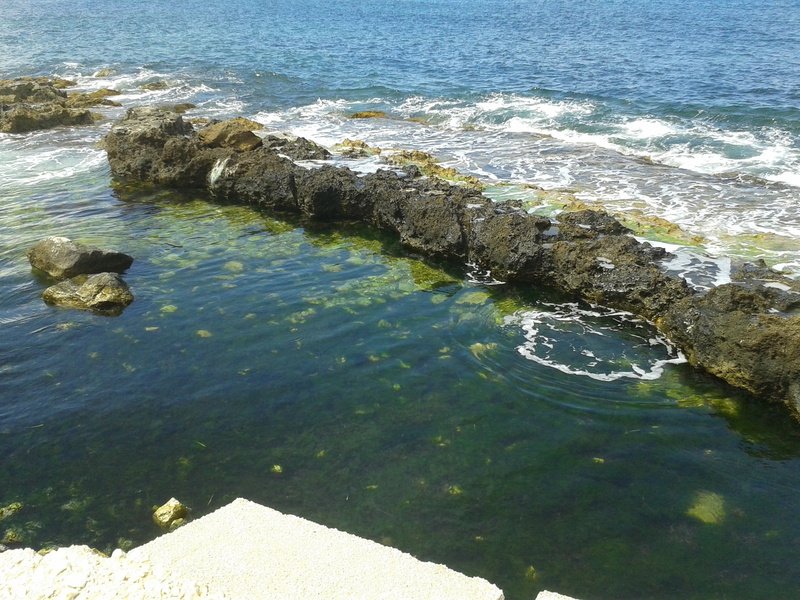 sunlight, beauty in nature, sea, rock - object, rock, high angle view, solid, wave, waterfront, scenics - nature, tranquility, trapani sea italy sicily