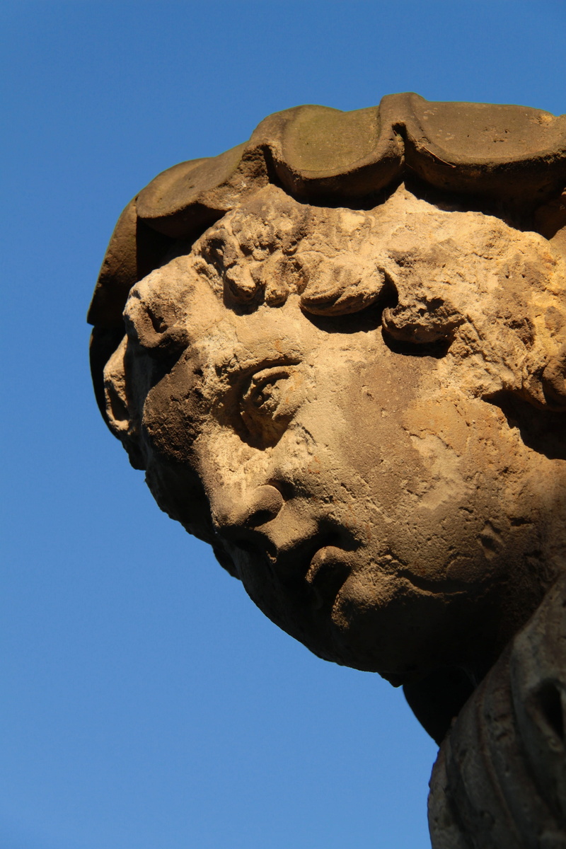 architecture And Buildings, day, ancient, Face, human representation, carving, Man, low angle view, sculpture, male likeness, solid, Monument, clear sky