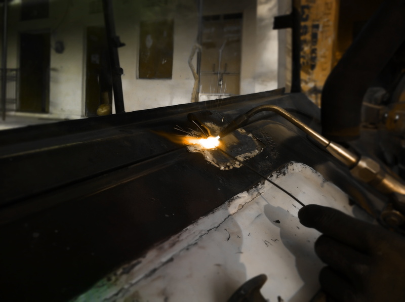 holding, fire - natural phenomenon, metal, metal industry, repairing, manufacturing, industrial, working, workshop, molten, no people, fire, motion, nature