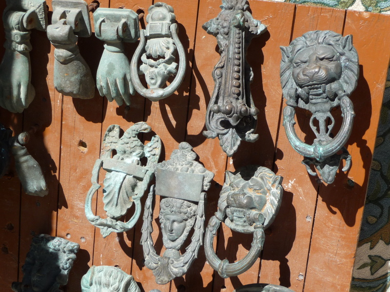 wall - building feature, cast, day, human representation, cast steel, no people, outdoors, old, sunlight, architecture, close-up, craft, machinery, rusty