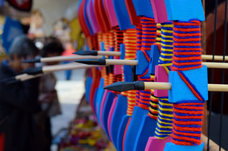 repetition, built structure, arc, belief, guerrero, multi colored, market, medieval, building, red, hanging, religion, arrow, close-up, 5K, no people
