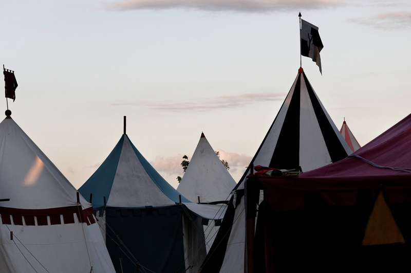 tent tips, no people, mode of transportation, sunset, travel destinations, tent, army camp, nature, building exterior, history, flag, built structure, day