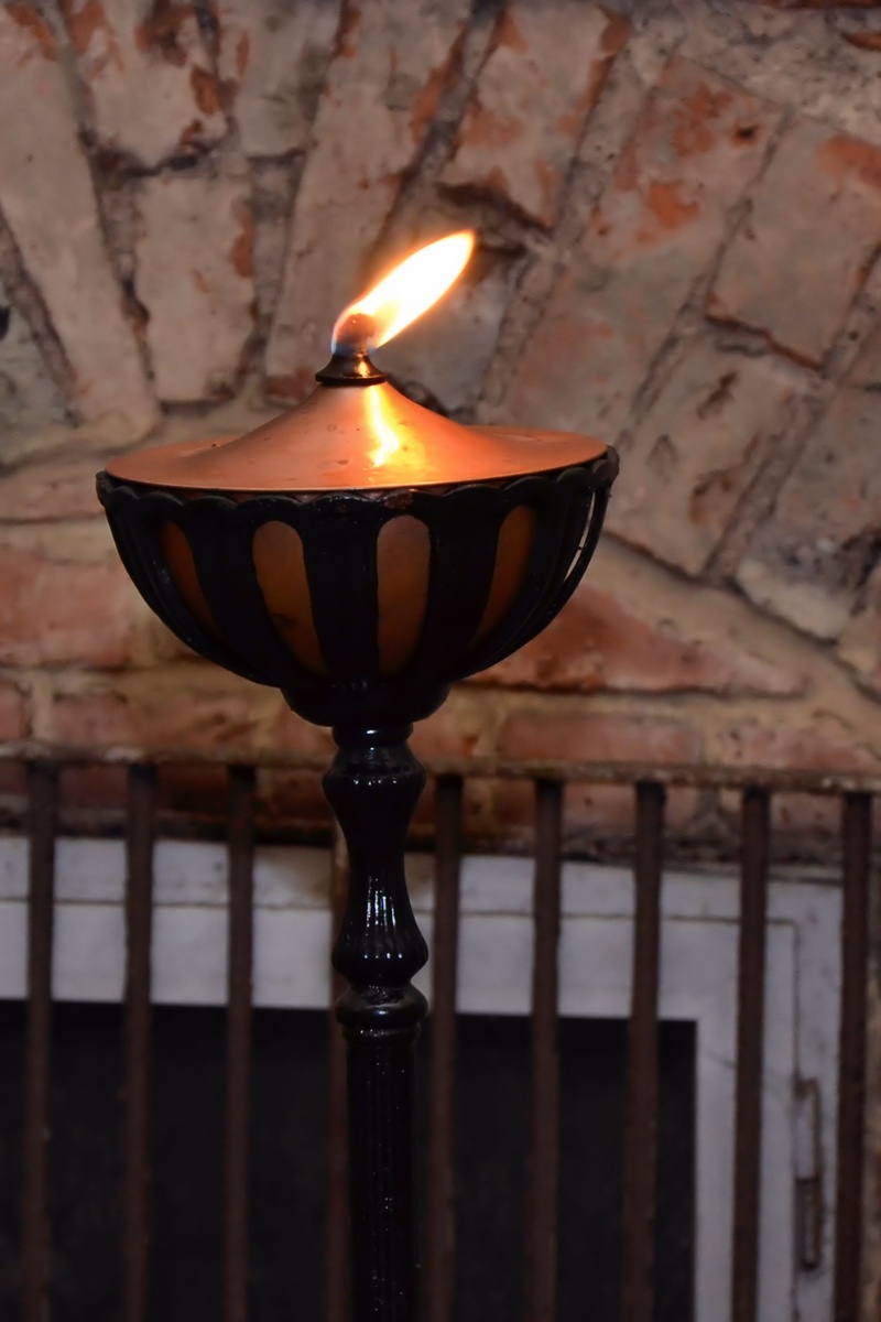 flame, metal, glowing, focus on foreground, indoors, candle, melting, illuminated, building, lighting equipment, burning, 2K, environment, oil lamp, fire - natural phenomenon