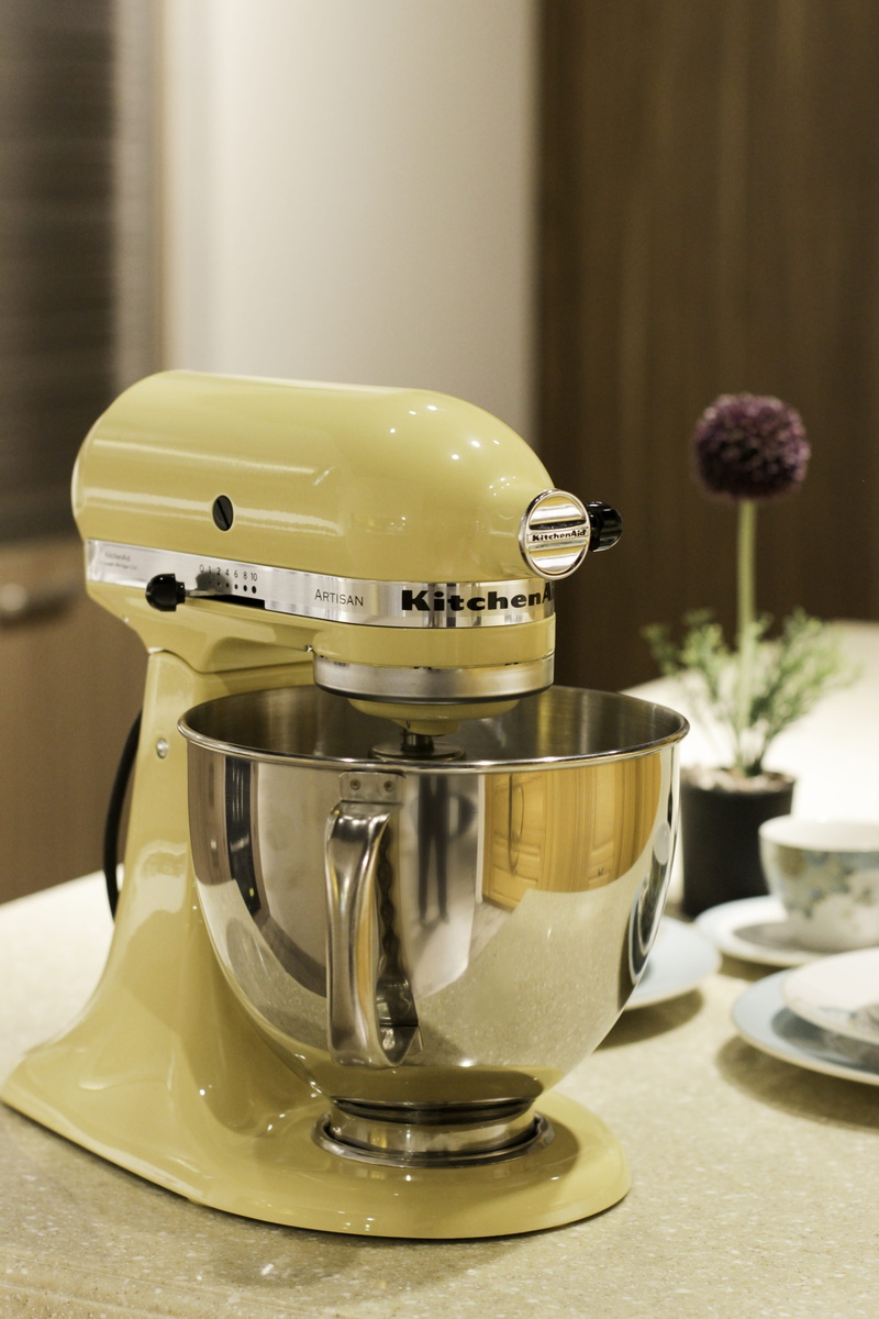 kitchenaid, mixer, food, cup, focus on foreground, no people, table, kitchen appliance, yellow, close-up, indoors, saucer, crockery, food and drink, clean