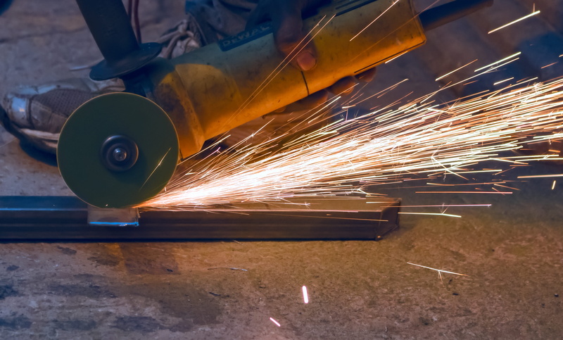 machine, iron - metal, alloy, metal cutting, airplane, long exposure, apparel, metal, welding, heat - temperature, metal grinding, one person, hardhat