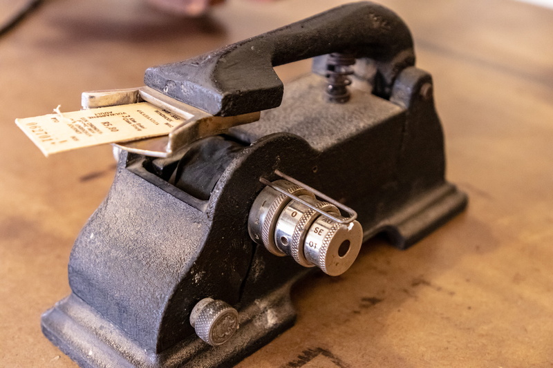economy, close-up, still life, antique, box, single object, hand tool, computer, metal, bronze, combination lock, machine, technology, wood - material