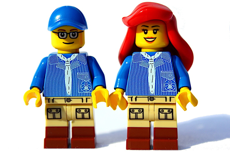sitting, two people, block stone, action figure, lego, mini figure, white background, miniature, pair, cut out, play, childhood, human, girl, boy, red