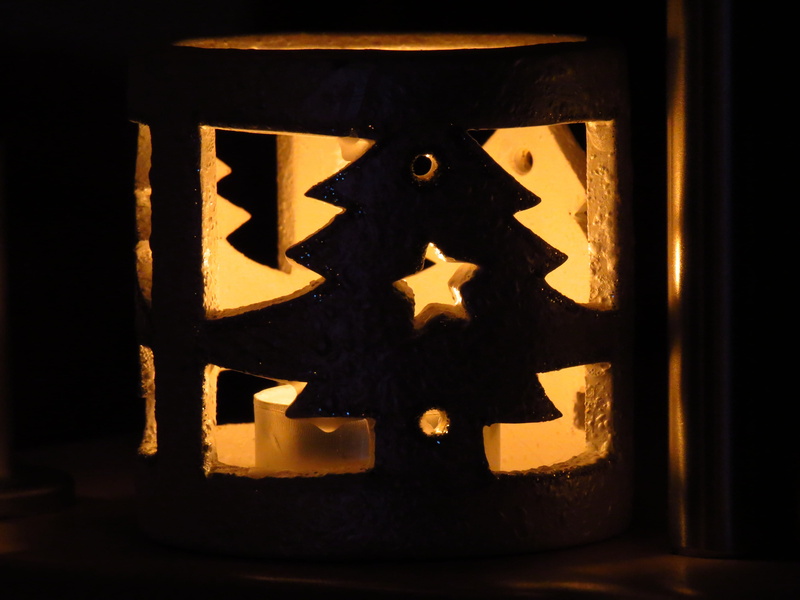 candle, close-up, indoors, illuminated, no people, christmas, black background, halloween, celebration, pumpkin, star, food, black color, art and craft