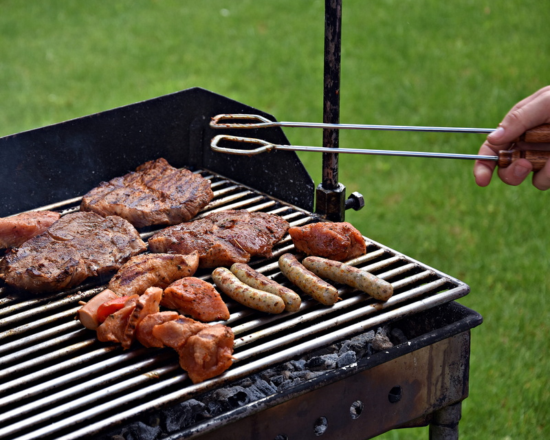 beef, sausage, barbecue grill, outdoors, leisure activity, day, freshness, meat, grass, close-up, holding, hand, serving tongs, human body part, 4K, human hand