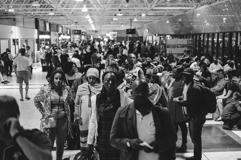 indoors, group of people, enjoyment, standing, illuminated, walking, 4K, lifestyles, architecture, ethiopia, women, men, leisure activity, public transportation