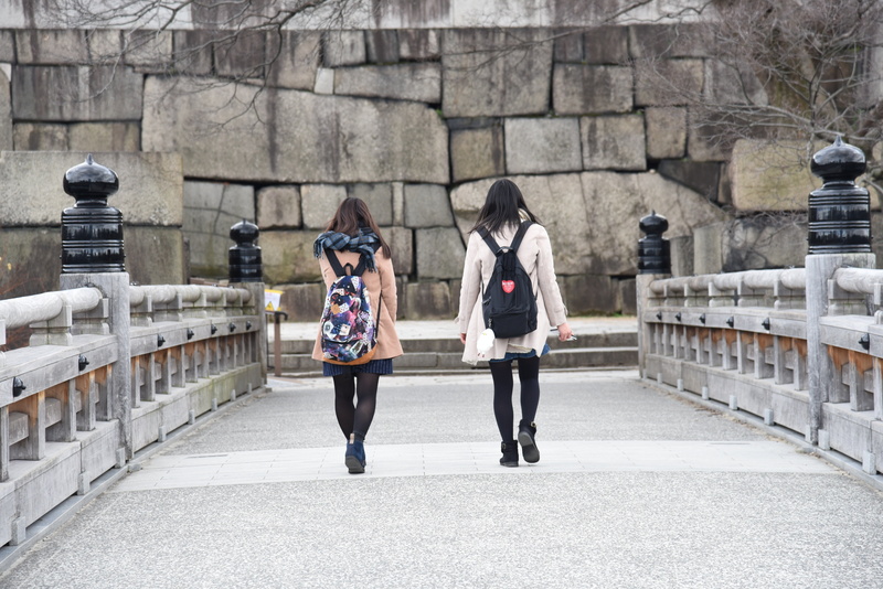 real people, women, city, architecture, osaka, rear view, tourism, bridge - man made structure, togetherness, on the move, stone, clothing, incidental people