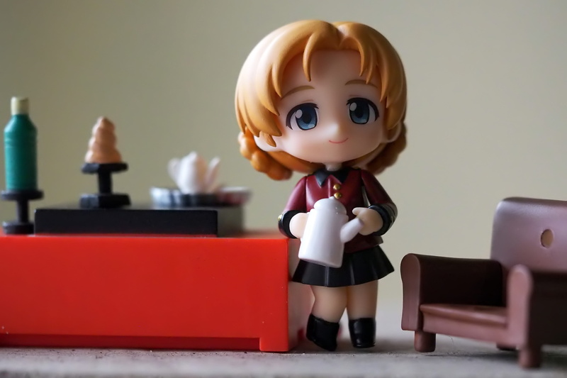 cartoon, creativity, technology, wall - building feature, character, lady, doll, pot, table, tea, human representation, female likeness, representation