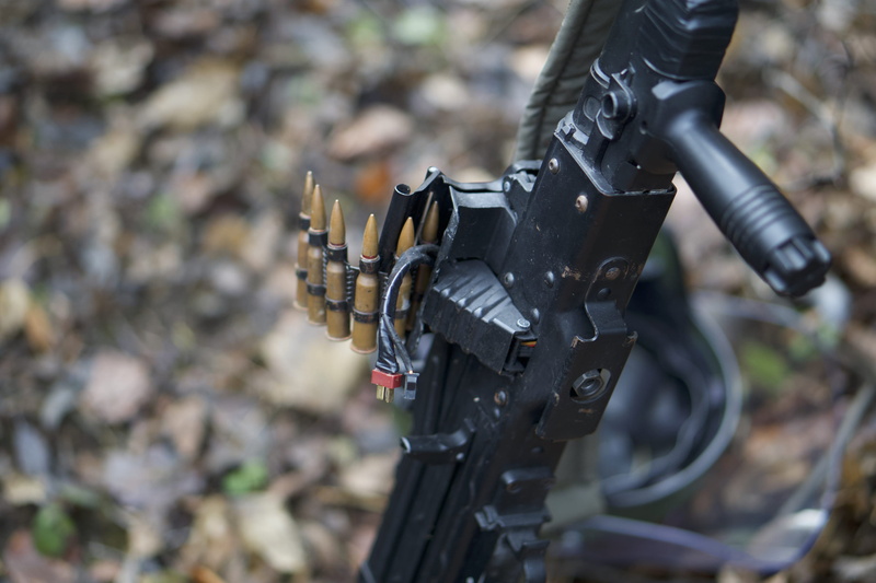 military uniform, bicycle, field, close-up, government, land, airsoft, machinery, weapon, black, electronics, forest, no people, spiral, vehicle, metal