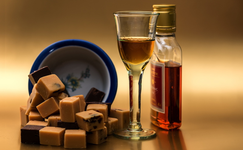 Caramel, close-up, wood - material, food, studio shot, table, Food and Drink, alcohol, Bottle, glass - material, temptation, refreshment, cognac, no people