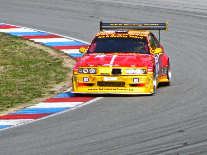 sports, day, motor vehicle, red, sports race, yellow, competition, outdoors, speed, multi colored, fast, driving, race track, vehicles, mode of transportation