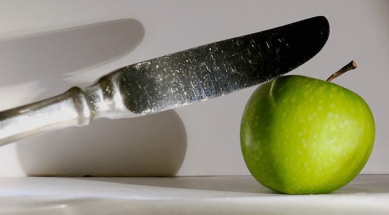 wellbeing, green color, studio shot, green, no people, gastronomy, fruit, table cover, apple, tine, fork, healthy eating, freshness, group of objects, white background