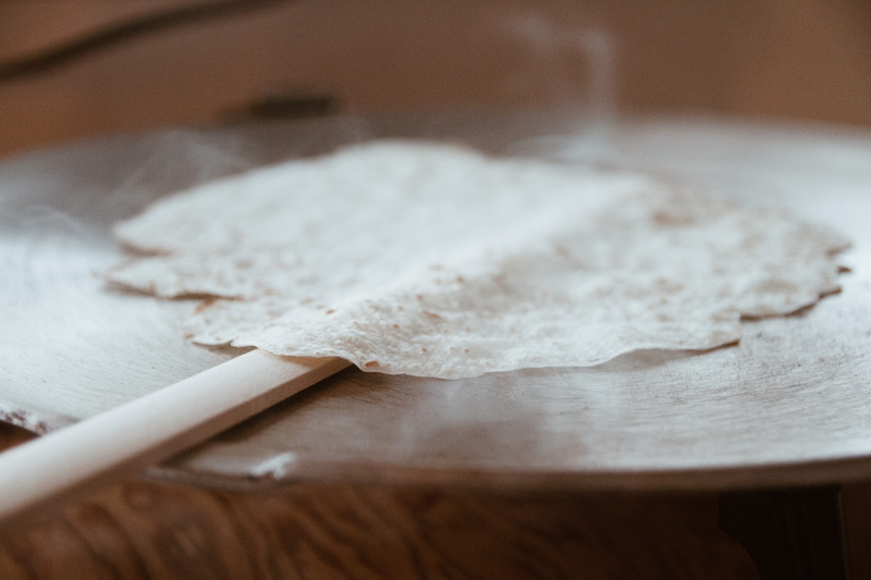 mixing, preparing food, indoors, no people, preparation, cracker, powder, mixing bowl, cooking batter, domestic kitchen, food, brie, spoon, wellbeing, furniture