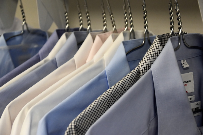 textile, large group of objects, assorted, indoors, shopping, close-up, hanging, jackets, variation, sale, in a row, choice, button down shirt, garment