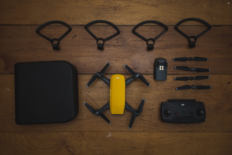 wood - material, prop guard, table, remote, order, still life, choice, group of objects, small, metal, indoors, multirotor, dji, large group of objects