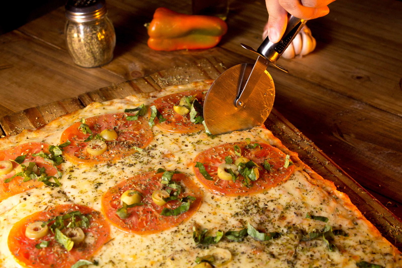wood - Material, holding, Pizza Shop, table knife, human body part, table, meal, italian Culture, italian food, Session, freshness, food And Drink, one person