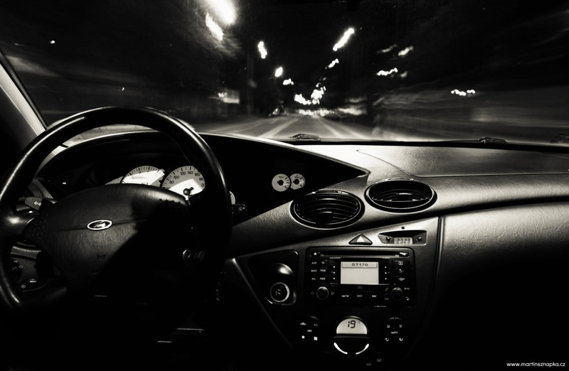 steering, control panel, windshield, vehicle, night, speed, illuminated, black, motor vehicle, one person, steering wheel, car interior, wheel, hand, mode of transportation