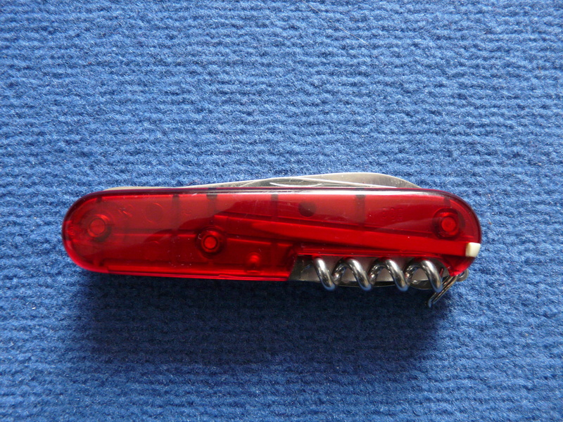 opener, pocket, transportation, toy car, knife, equipment, vibrant color, day, land vehicle, Pocket Knife, single object, toy, blue, hazardous, metal, textured