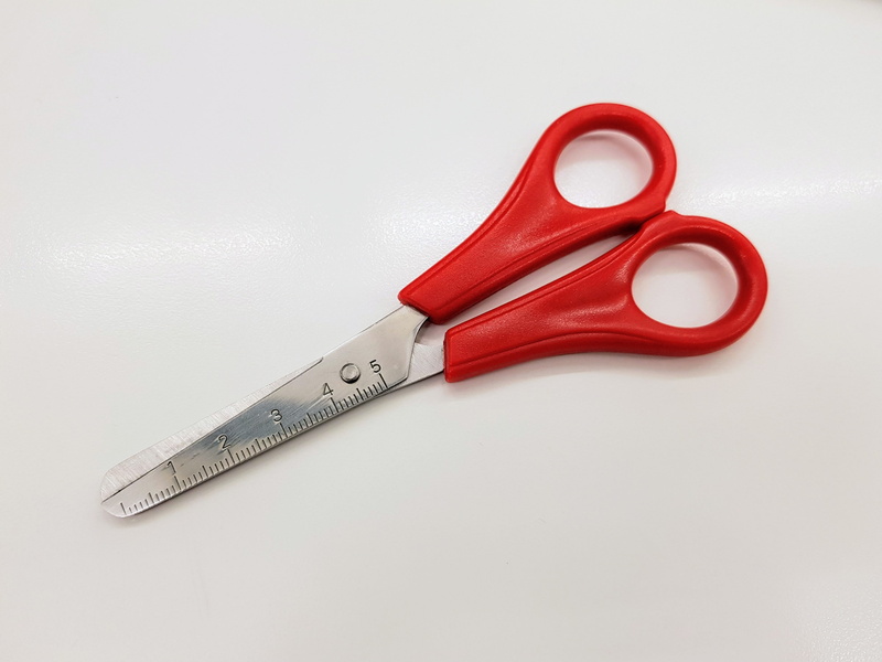 silver colored, close-up, scissors, handle, work tool, gray background, equipment, cut out, tool, indoors, desktop, simplicity, exert, red, haircut, single object