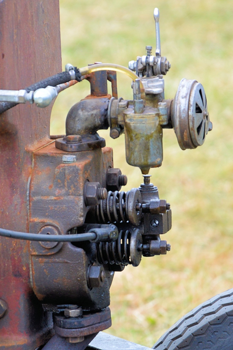 metal, land, old, outdoors, valve, historically, mode of transportation, control, plant, petrol, train, day, focus on foreground, carburetor, motor, functional
