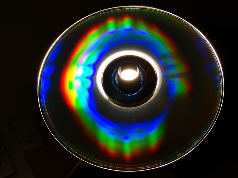 color, silver, close-up, cd, indoors, rainbow, studio shot, abstract, computer, light - natural phenomenon, technology, multi colored, no people, dvd, black background