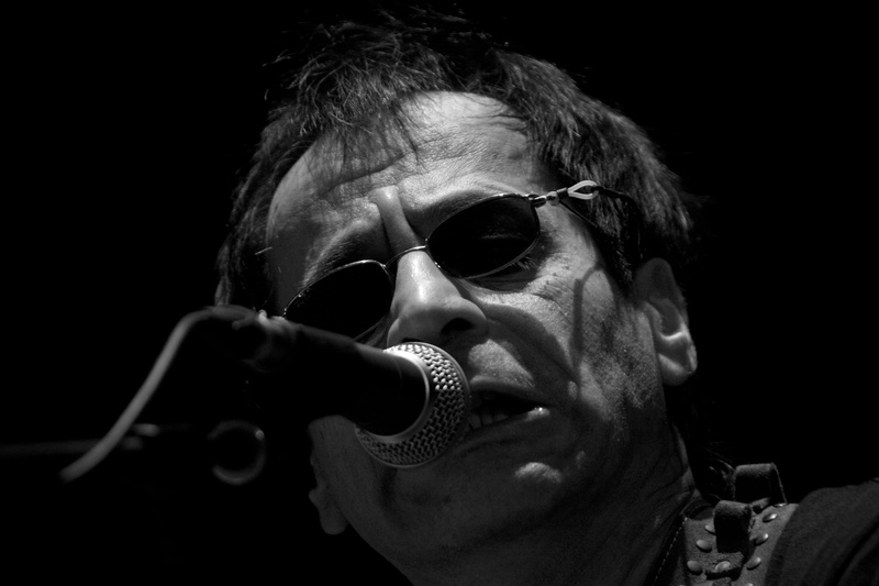 black background, mid adult men, portrait, indoors, blackandwhite, italy, mouth open, dark, lifestyles, music, headshot, males, spooky, microphone, front view