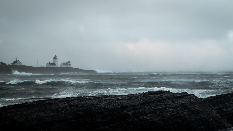 land, surfing, foggy, motion, shore, outdoors, power in nature, built structure, scenic, rocks, seascape, cloudy, sky, sea, ocean, wave, lighthouse, clouds