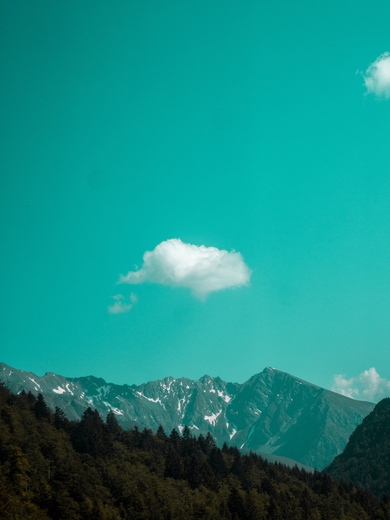 mountain peak, la morte, beauty in nature, idyllic, cloud, turquoise, day, tranquil scene, air pollution, mountains, mountain, turquoise colored, no people