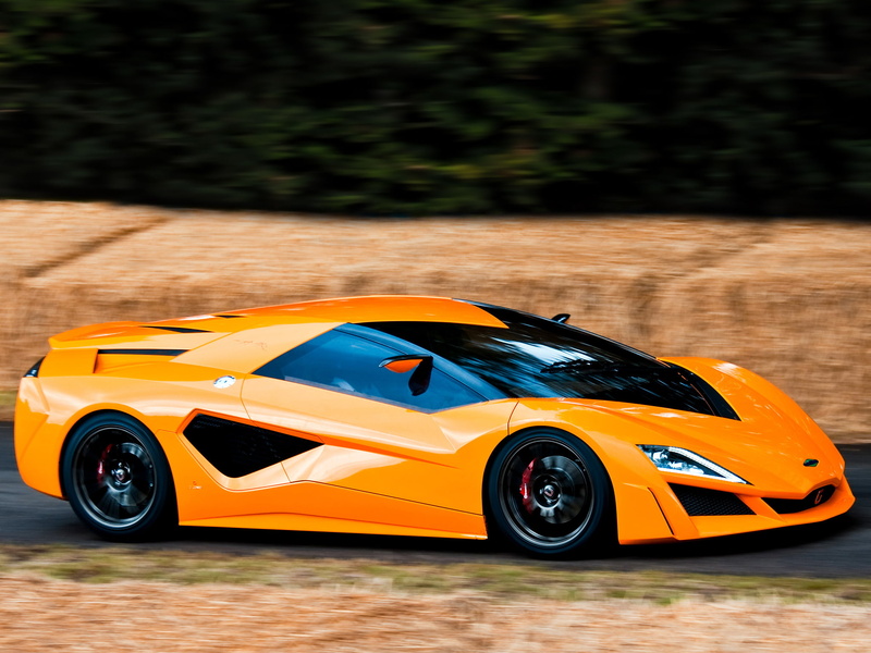 focus on foreground, orange, side view, nature, mode of transportation, speed, no people, day, yellow, competition, auto racing, frazer-nash namir, land vehicle