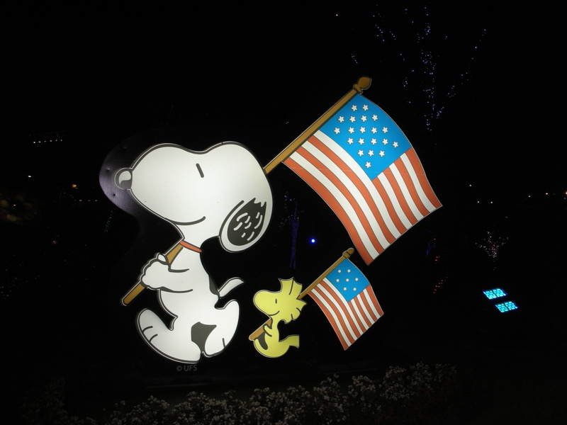 outdoors, woodstock, standee, high angle view, american flag, shape, illuminated, celebration, patriotism, decor, animal representation, snoopy, star shape