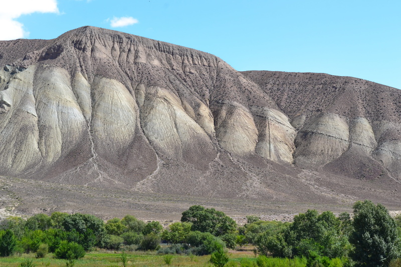 sky, non-urban scene, plant, erosion, landscape, central asia, scenics - nature, rock formation, quarry, environment, tree, arid climate, tranquility, day