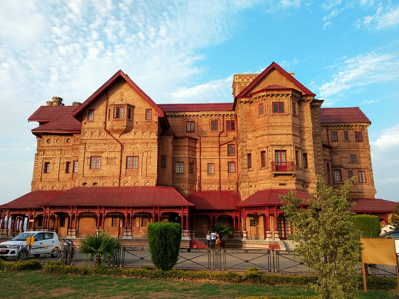 row house, sky, street, residential district, built structure, house, plant, mode of transportation, outdoors, amar mahal museum and library, transportation