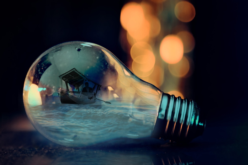 boat, digital composite, lighting equipment, focus on foreground, glass - material, ocean, graphics, glass, close-up, single object, outdoors, technology