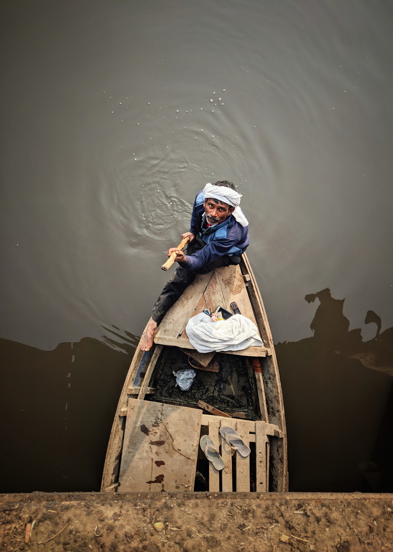 full length, person, watercraft, sitting, boatman, nautical vessel, day, casual clothing, adult, leisure activity, man, one person, ripple, transportation