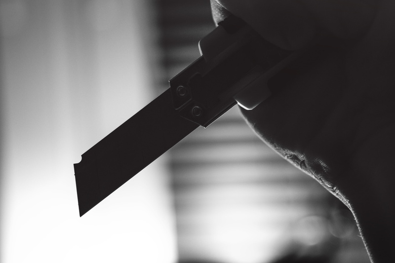 hand, knife - weapon, focus on foreground, sharp, steel, razor, one person, knife, person, horror, instrument, fear, utility, crime, indoors, retractable