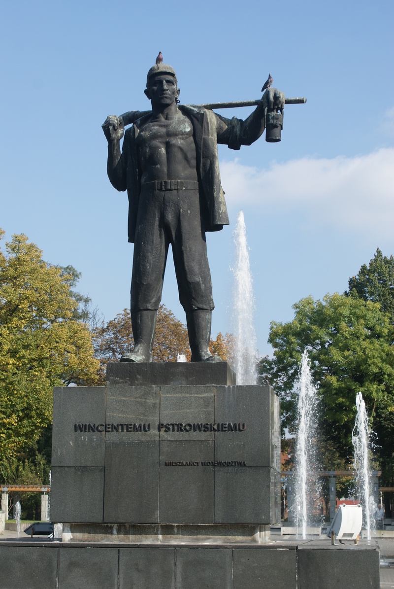 sculpture, vincent pstrowski, text, male likeness, outdoors, built structure, creativity, monument, getter, memorial, the past, no people, pstrowskiego monument in zabrze