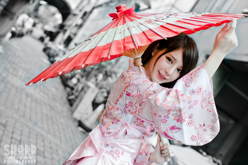 child, females, three quarter length, lifestyles, outdoors, umbrella, innocence, happiness, real people, one person, 5K, smiling, zhang qi jun, women