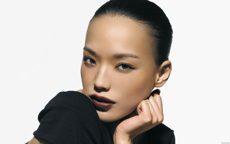 front view, looking at camera, one person, close-up, shu qi, human face, headshot, young adult, portrait, young women, contemplation, black hair, indoors