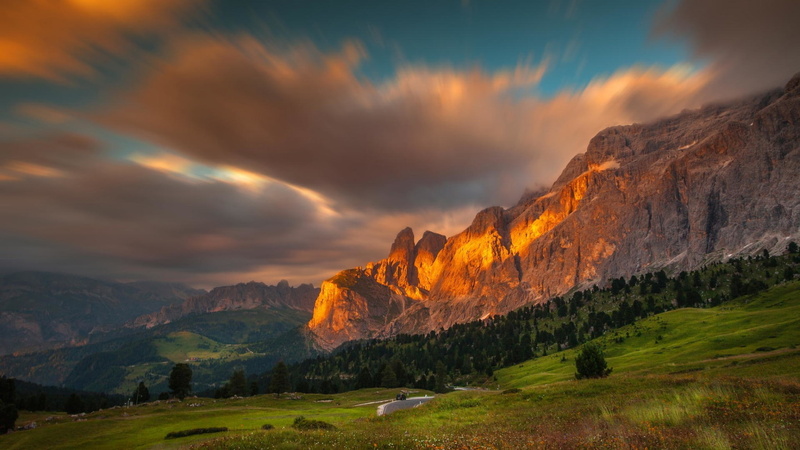 sky, sunset, mountain, outdoors, nature, grass, plant, road, mountain range, valley, cloud - sky, scenics - nature, field, mountains, beauty in nature