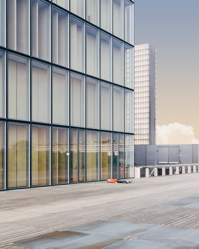 light, modern, outdoors, background, looking up, curtain, floor, glass - material, city, man, sky, ground, facade, sunlight, no people, beside, skyscraper