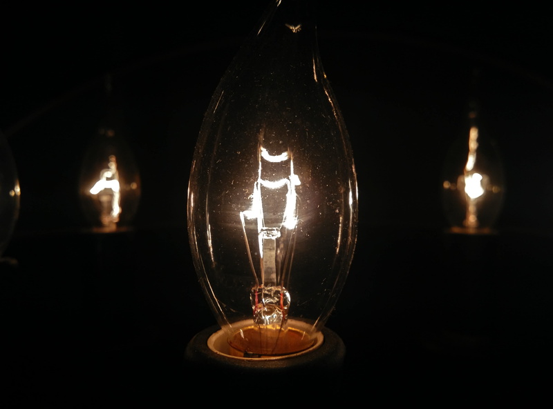 filament, domestic room, glass - material, black background, transparent, close-up, malaysia, illuminated, electric lamp, technology, light - natural phenomenon