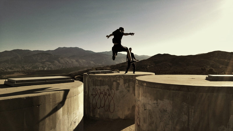 outdoors, stunt, 5K, one Person, jumping, real people, mountain range, sky, man, concrete, full Length, daytime, skateboard, photo, nature, lifestyles